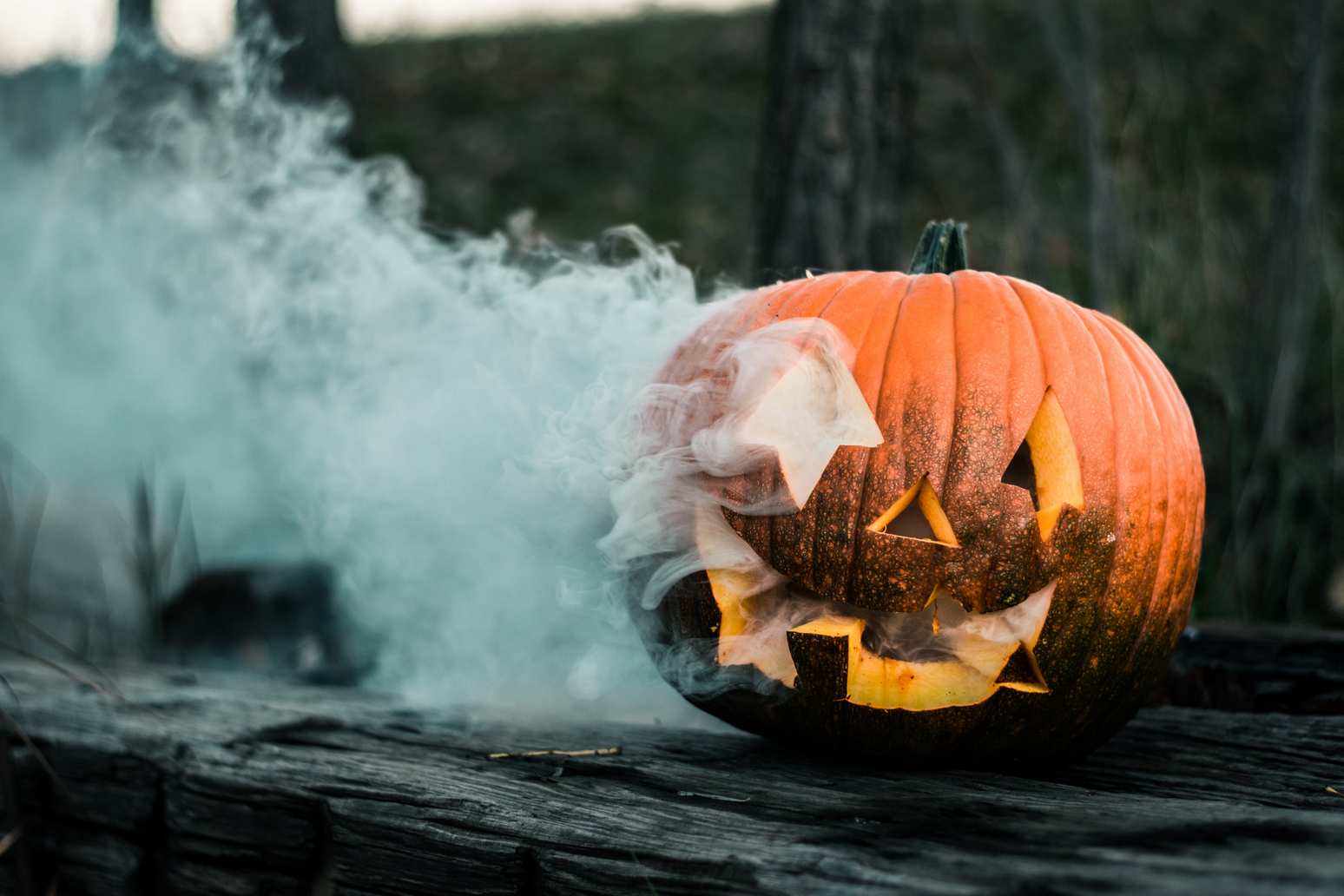 Jack-o'-lantern with smoke coming out of its eyes and mouth